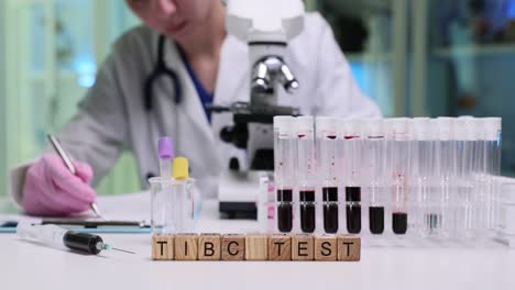 medical professional conducting tibc blood test in laboratory
