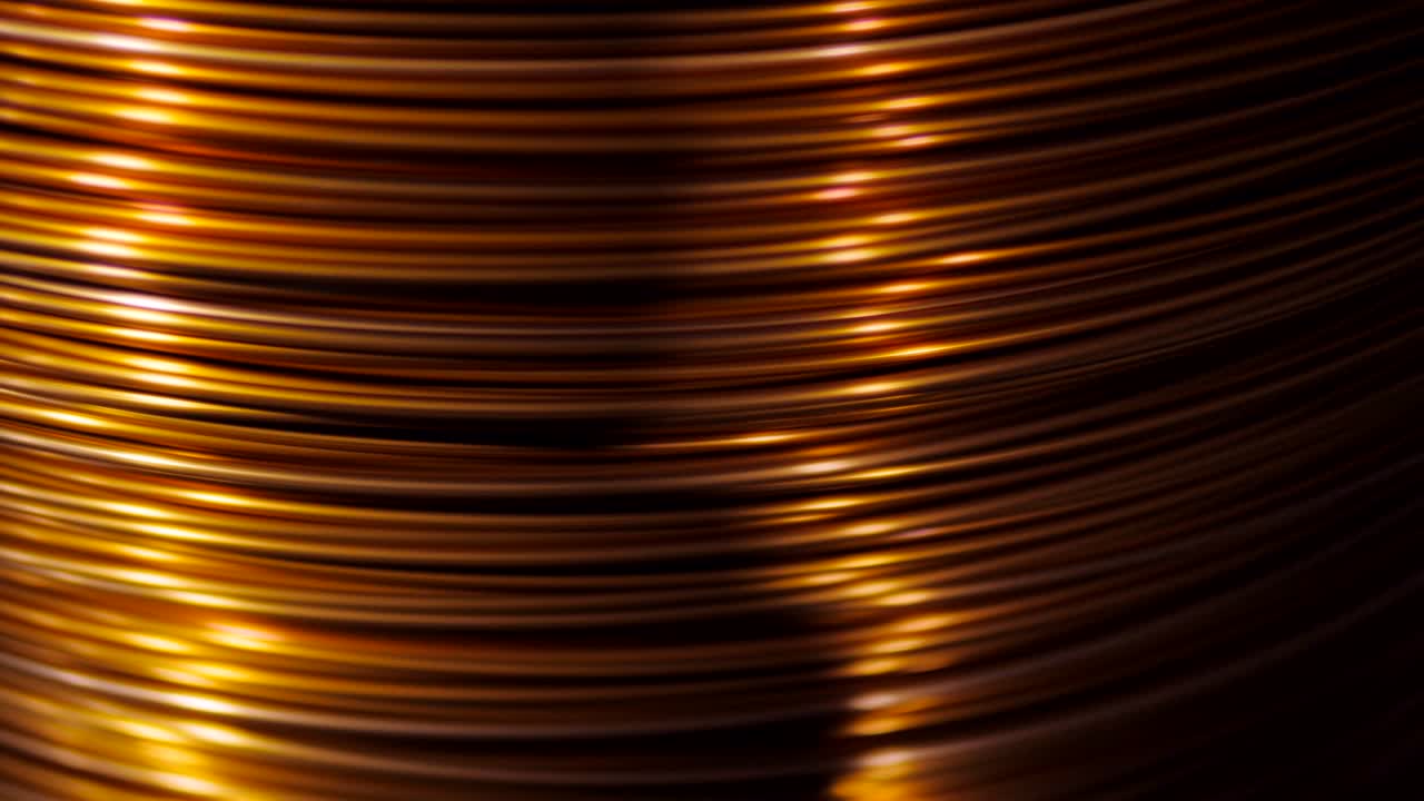 Close-up of the rotation of the coil and wrap it copper wire. Manufacture of electric cable.