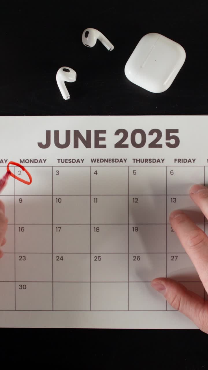 June 2025 Calendar with Wireless Earbuds and Hands