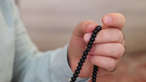 muslim prayer using beads in mosque 2