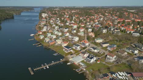 aerial view of exclusive seaside houses in prosperous suburb