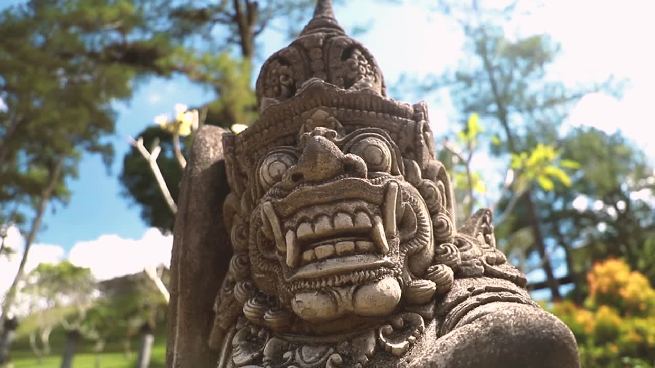 A stone statue of a Hindu god - the Balinese Holy Water Temple near Tampaksiring &mdash; Ubud