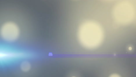 animación de foco azul con destello de la lente sobre puntos de luz bokeh en gris
