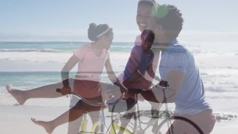 Animation-of-happy-african-american-couple-with-bikes-over-seascape