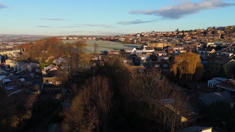 A-drone's-eye-view-captures-Dewsbury-Moore-Council-estate's-fame,-a-typical-UK-urban-council-owned-housing-development-with-red-brick-terraced-homes-and-the-industrial-Yorkshire