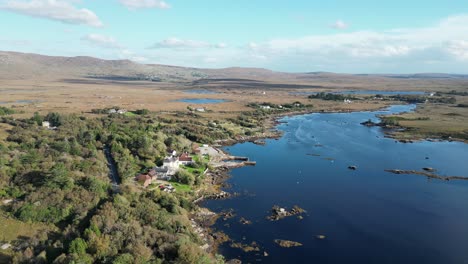 aerial view over the beautiful blue river with picturesque scenery at connemare screebe at furnace road in galway during an exciting journey through the beautiful landscape of ireland