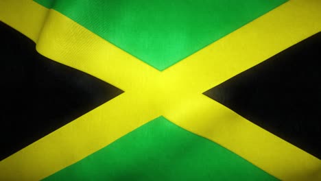 la bandera de jamaica ondeando en el viento