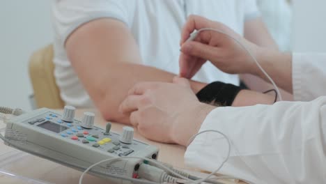 patient nerves testing using electromyography at medical center