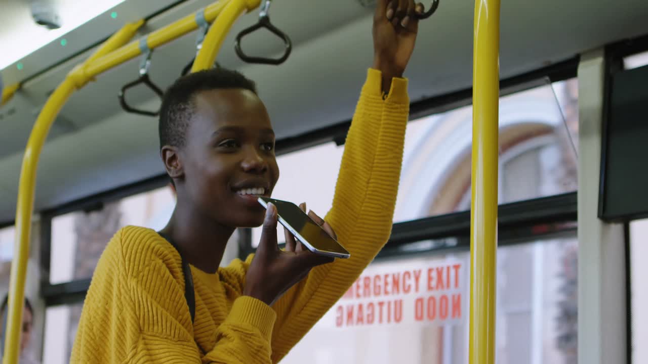 Woman talking on mobile phone while travelling in bus 4k