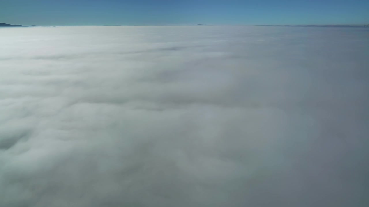Aerial View of Thick Fog Covering the Landscape
