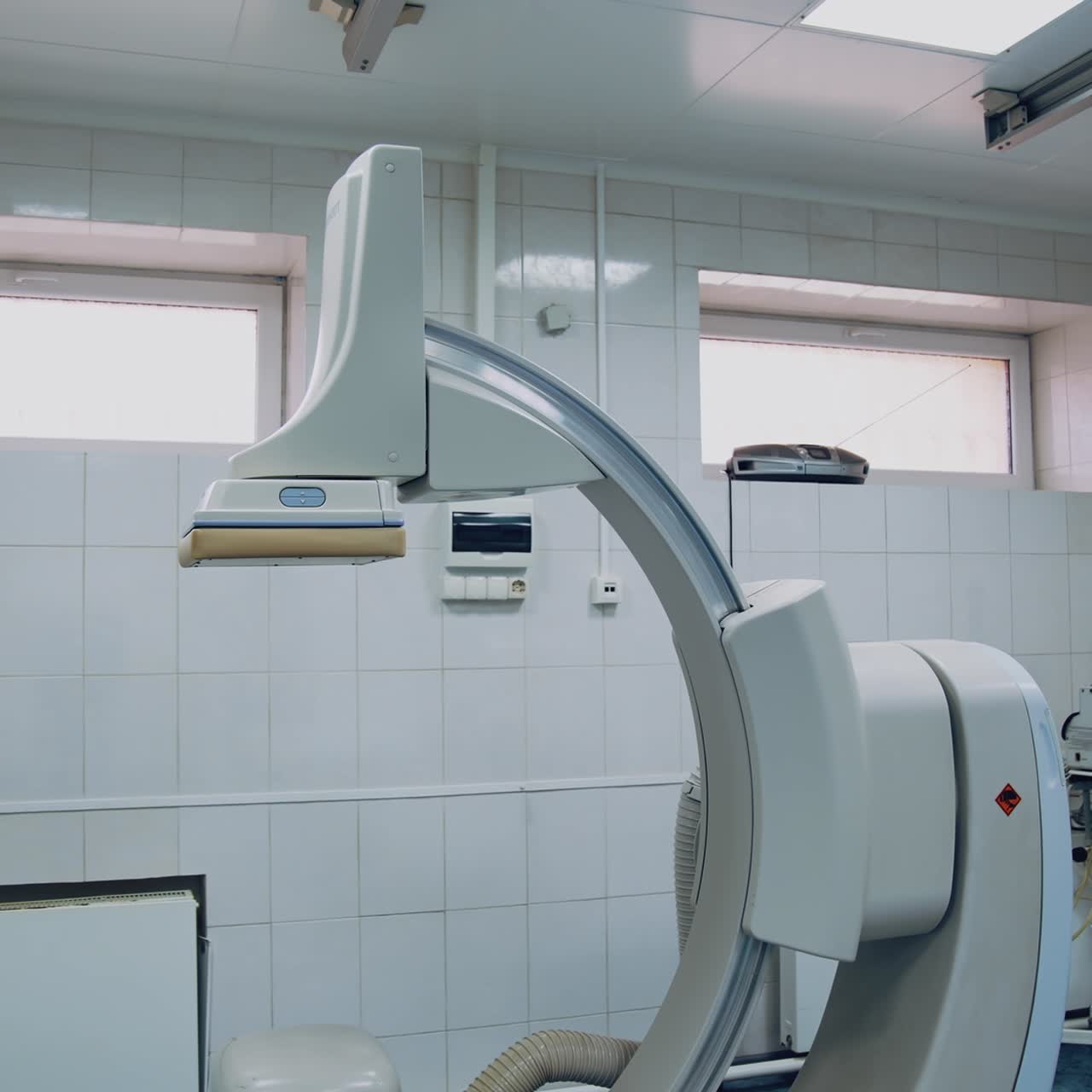 Medical equipment in clinic. Modern surgical device in the operating room. Light surgical room with no people in hospital