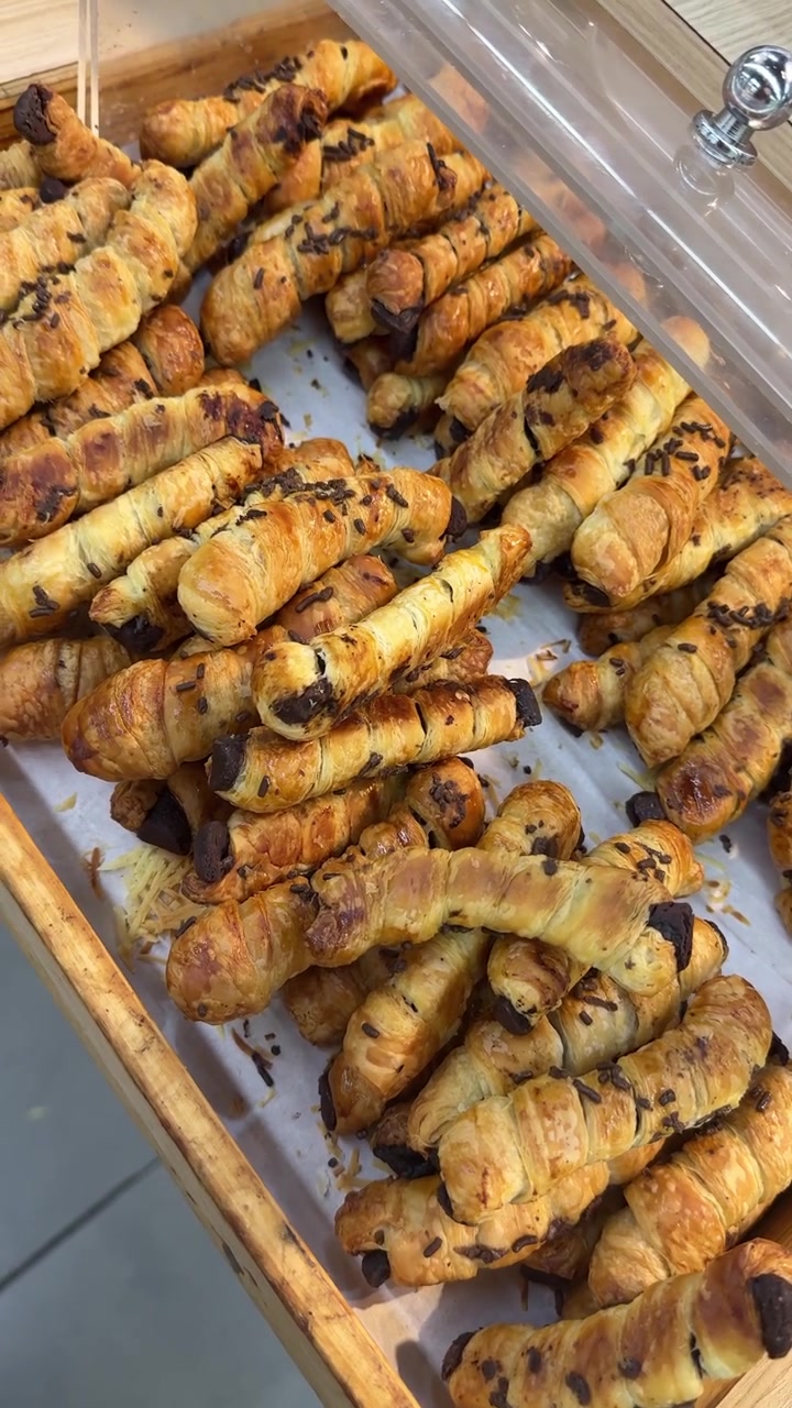 Freshly Baked Mini Chocolate Croissants on Display