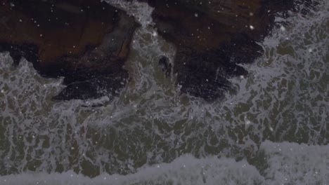 animation of falling dots over seascape
