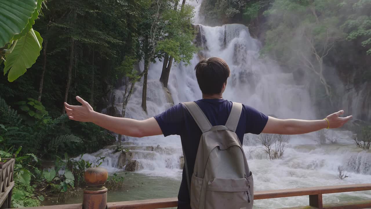 Asian Man Enjoy With Waterfall, Slow Motion