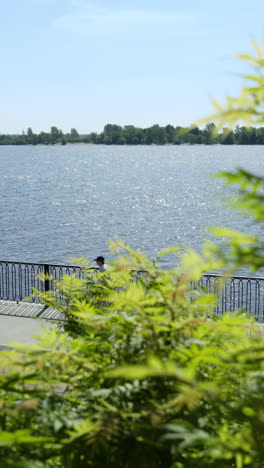 riverbank scene with people