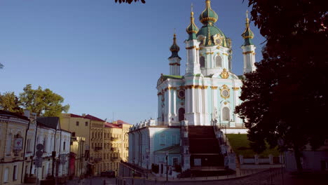 static clip of st andrews church kiev framed by trees on an early autumn morning