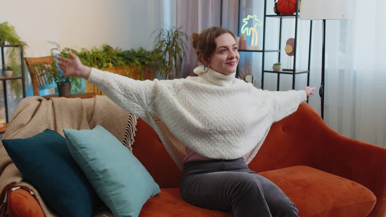 Tired lazy woman enjoy relaxing on home sofa resting napping after hard working day closed her eyes