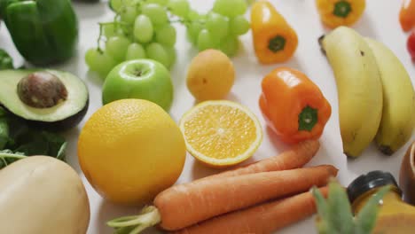 Video-of-fresh-fruit-and-vegetables-on-white-background