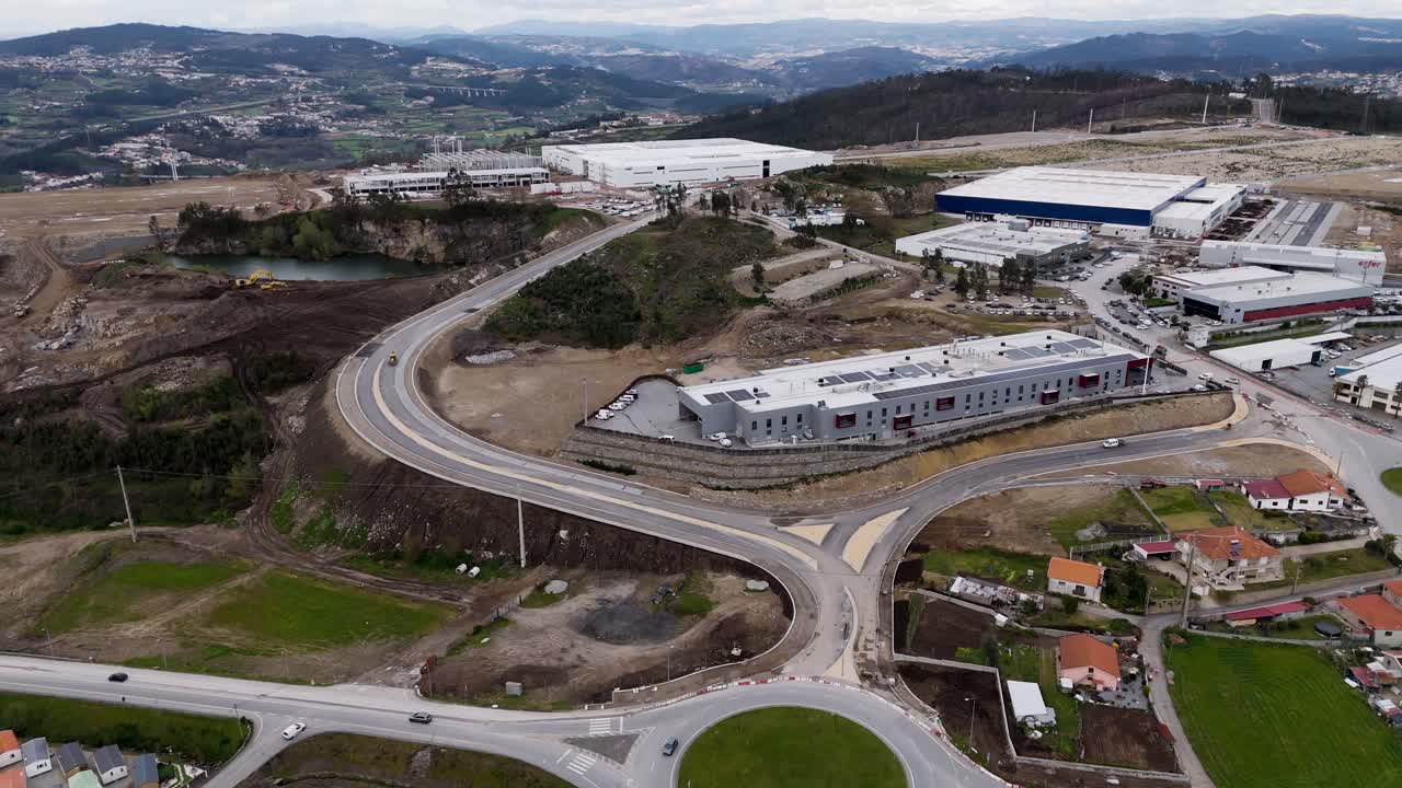 curved highway and factories in revinhade industrial park felgueiras portugal