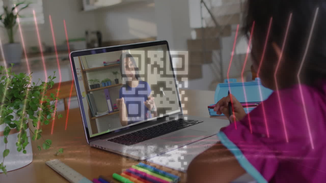 Child learning online with QR code animation over laptop screen