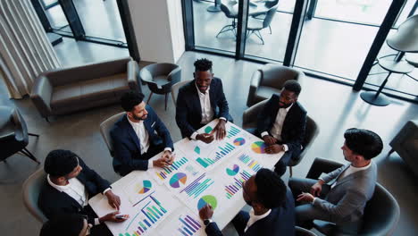 business professionals analyzing data and charts