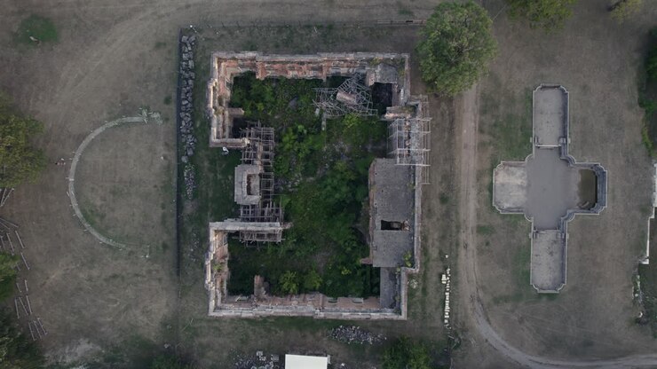 Ruins of Cantacuzino Palace, Petit Trianon of Floresti, Romania,seen from above with zoom in, drone footage