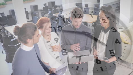 animation of clock moving over diverse colleagues discussing work in office