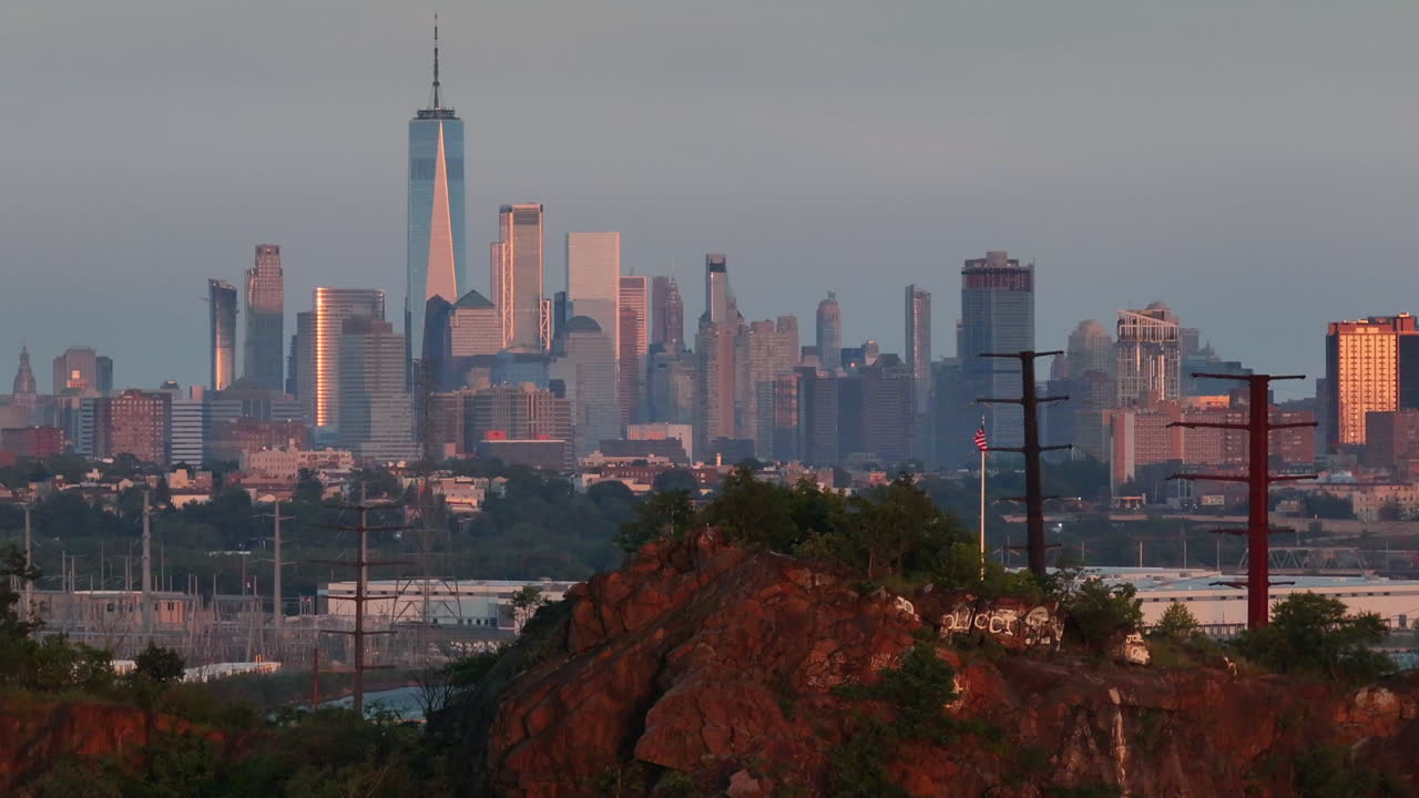 Aerial view of an American flag flying in front of The World Trade Center