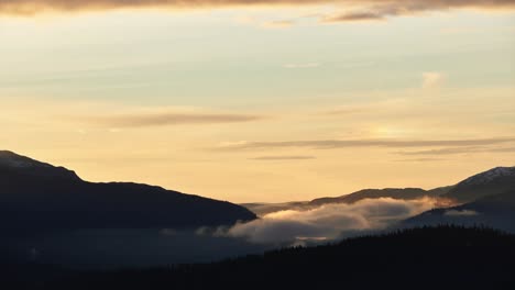 Close-up-shot-of-dancing-fog-in-the-Norwegian-mountains-during-a-crisp-autumn-morning