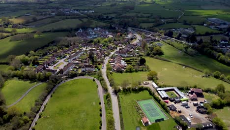 high altitude drone video footage of a small village in england