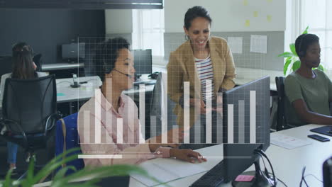 businesswomen collaborating at office with bar graph data animation overlay