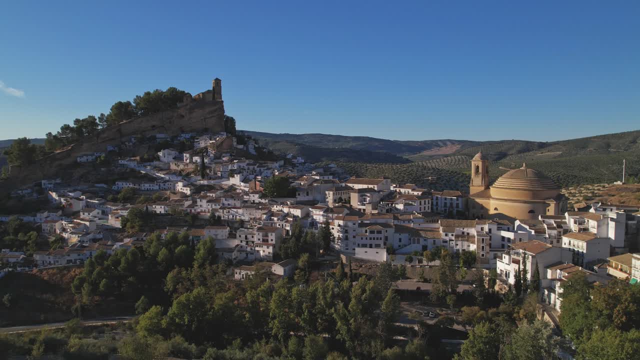 Spain. Montefrio. White villages, houses on mountain slopes. Pretty Spanish town, famous by National Geographic. Panoramic aerial view. White villages, houses on mountain slopes. Andalusia. Spain.