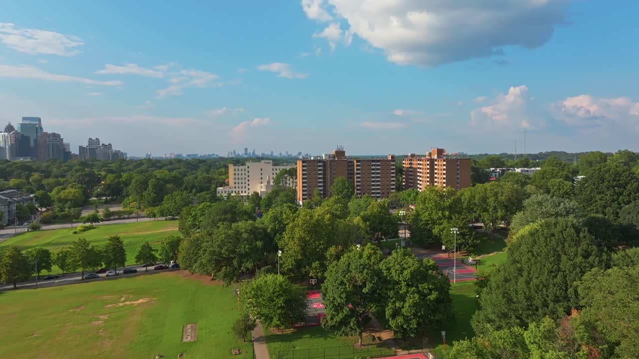 Basketball court in Central Park in fourth West neighbourhood, Atlanta city urban park and playground, Georgia, Drone shot