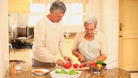 Mature-couple-cooking-together