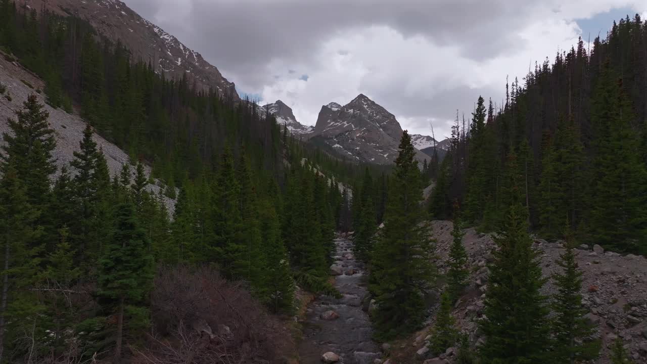 Huerfano River valley Blanca Peak Mt Mount Lindsey Lily Lake trail Sangre de Cristo Range Colorado aerial drone spring Summer San Isabel forest Iron Nip ple Rocky Mountains gray clouds forward motion