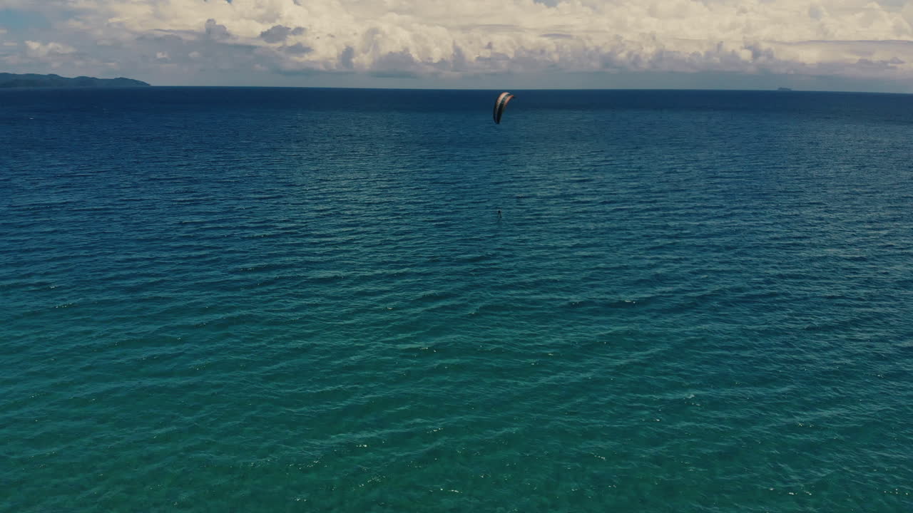 Kiteboarding over the ocean