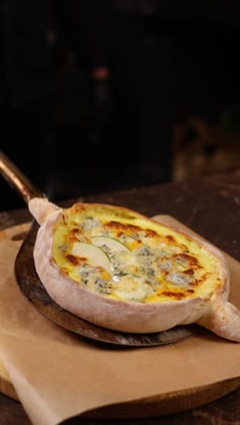 delicious khachapuri with pears and blue cheese