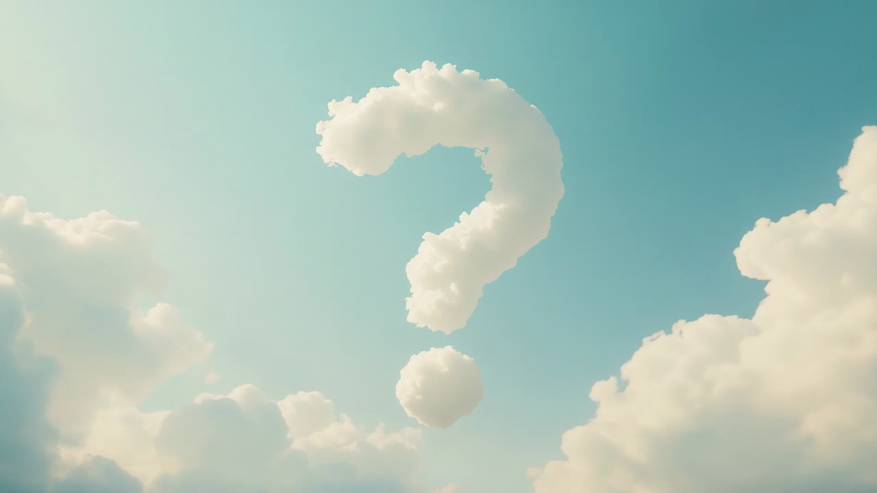Forming cloud taking question-mark shape in pale blue sky, with surrounding cumulus on horizon