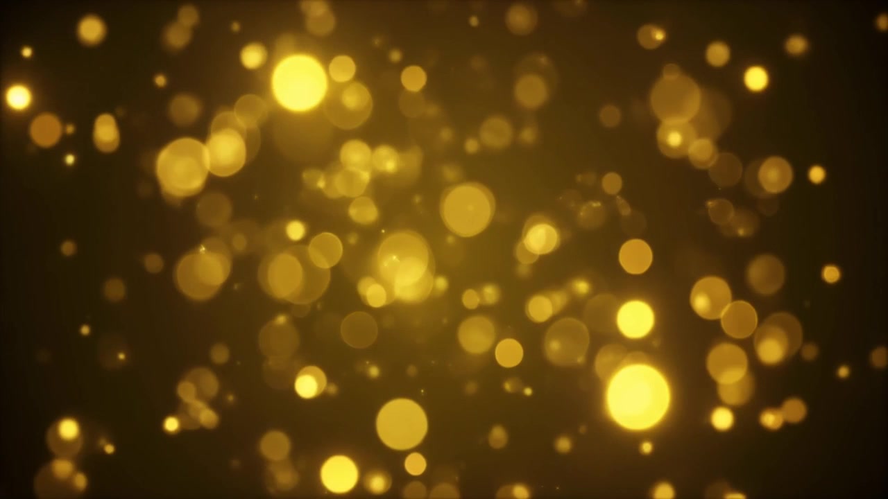 Abstrakte gyldne bokeh-partikler, der svæver på mørk baggrund
