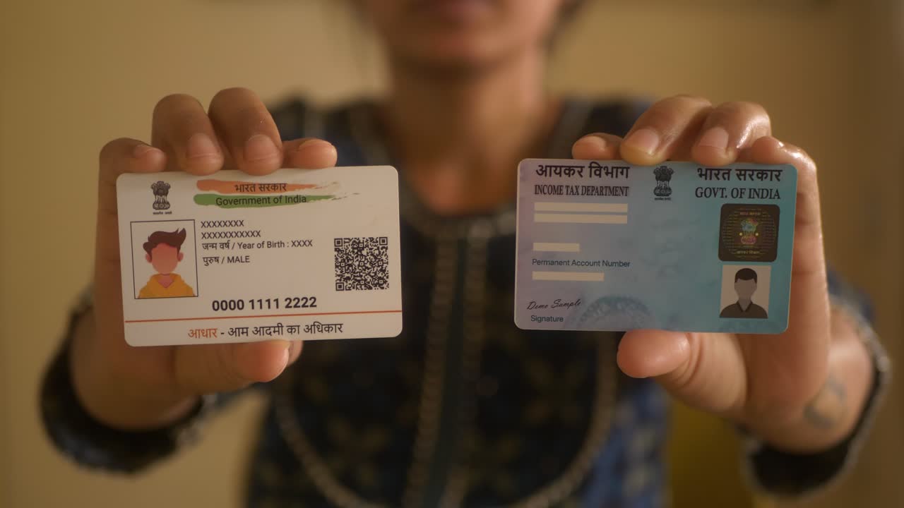 Indian woman reveals Indian PAN card and Aadhaar card, government programmes, closeup