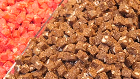 assorted colorful and brown sweet cubes