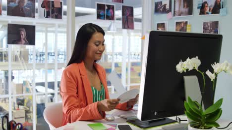 Young-woman-working-in-a-creative-office