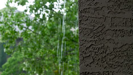 Lluvia-Cayendo-Por-Canaletas-A-Lo-Largo-De-Una-Pared-De-Balcón-De-Hormigón-Con-árboles-En-Segundo-Plano.