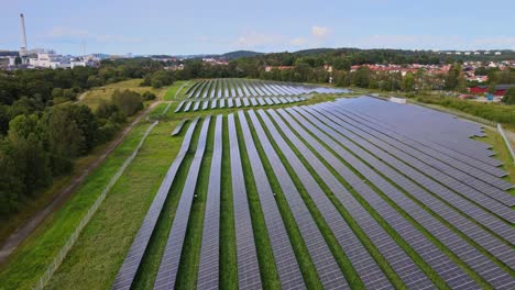 Solar-Station-On-Agriculture,-Solar-Power-Plants,-Solar-Panels-Farm-In-Utby,-Gothenburg,-Sweden---aerial-drone-shot