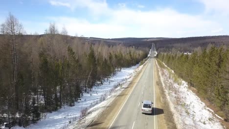 scenic winter road through forest