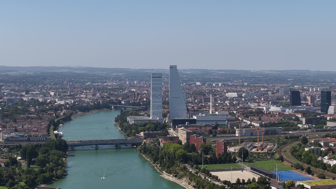 City view of Basel, Switzerland, with Roche Towers, the Rhine River, and the city skyline,