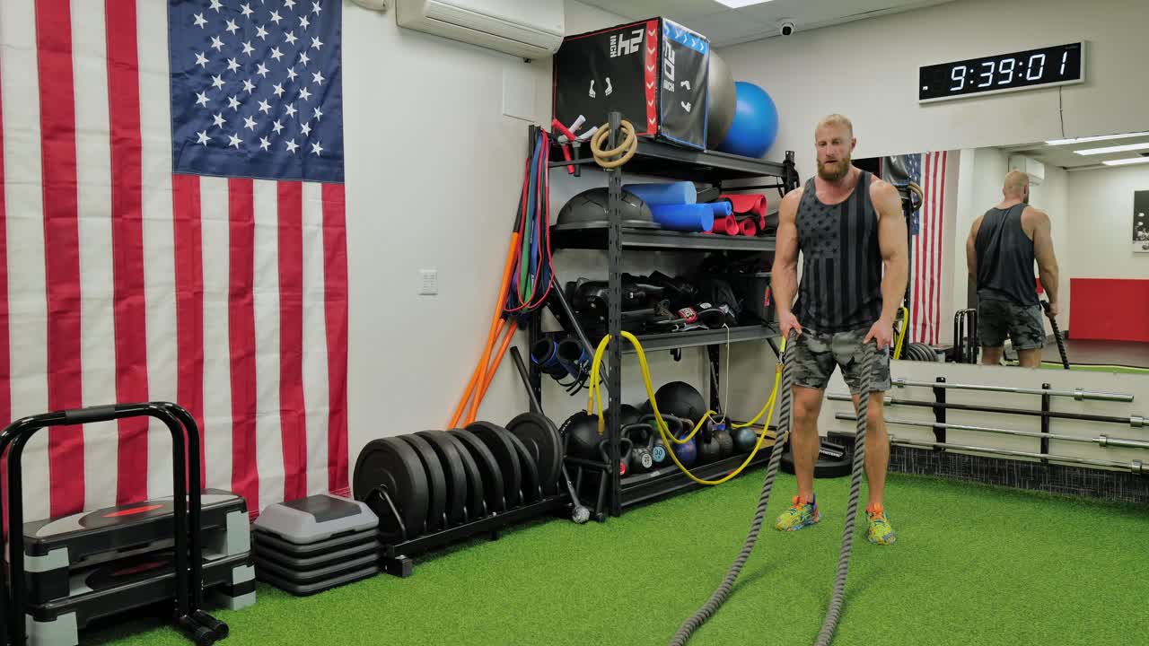 Muscular bodybuilder handsome men doing exercises in gym