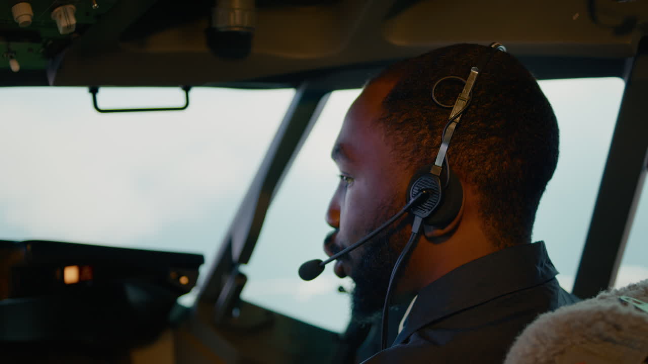 African american copilot taking off with airplane captain