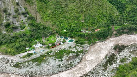 Aerial-drone-view-of-Urubamba-river-crossing-the-jungle,-close-to-Machu-Picchu-Pueblo,-sacred-valley,-Cusco-region,-Andes,-Peru,-South-America