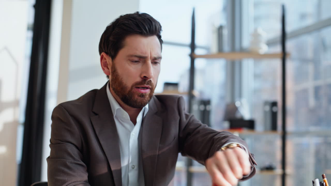 Concerned employee worried project problem sitting company office closeup